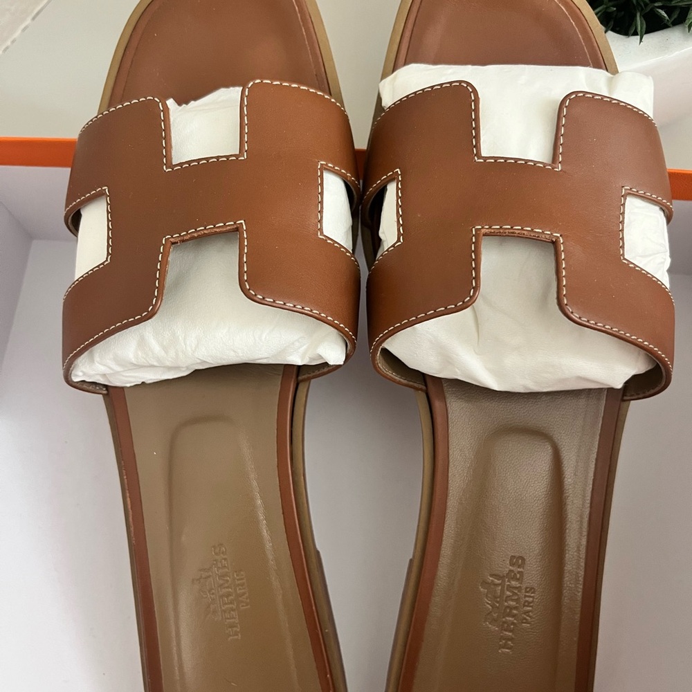 Brown and White Leather Slip-On Sandals